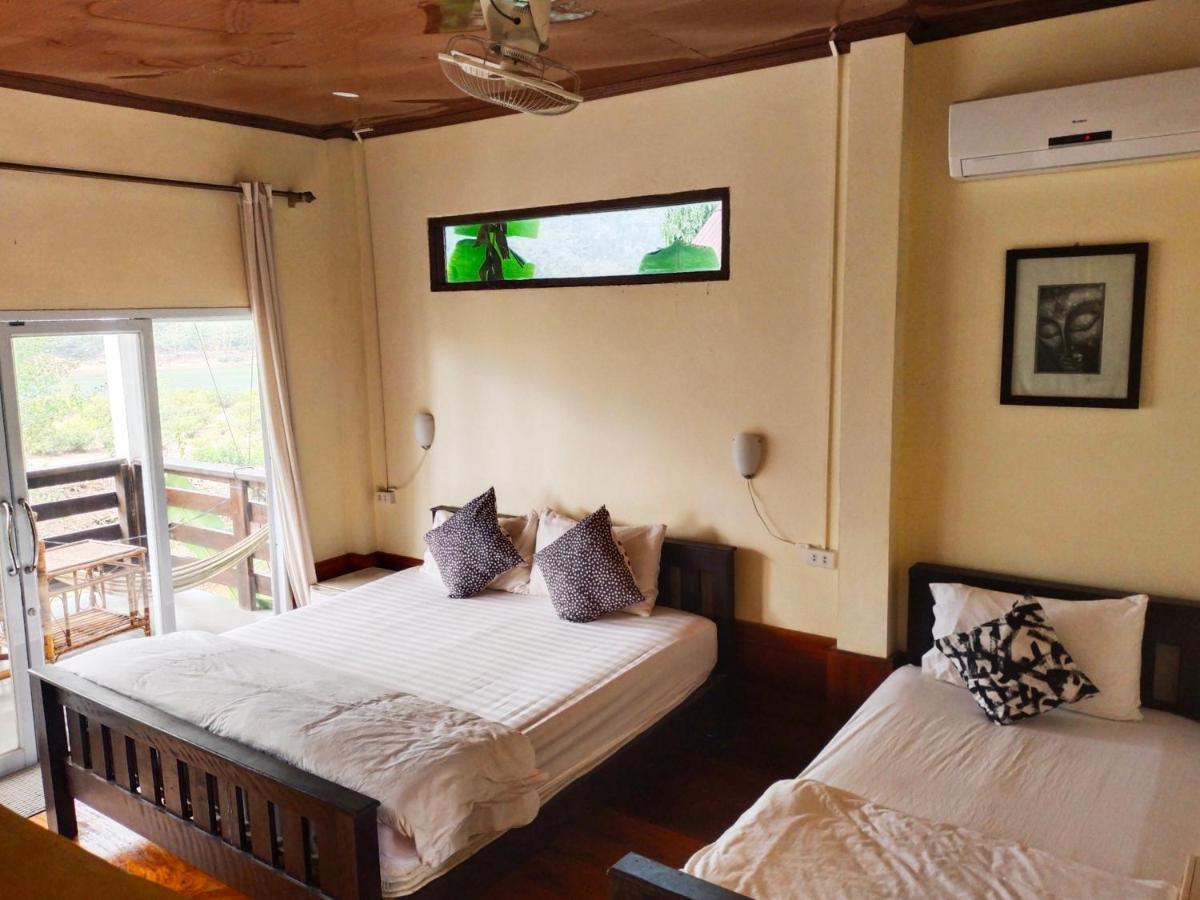 Pdv Guesthouse Muang Ngoi Екстериор снимка